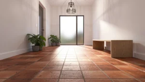 Entrée avec sol en terre cuite usé après six mois, ambiance chaleureuse et naturelle, décoration intérieure