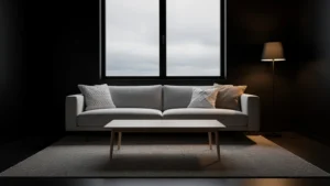 Intérieur sombre en total look scandinave minimaliste avec lumière tamisée et mobilier clair en bois naturel